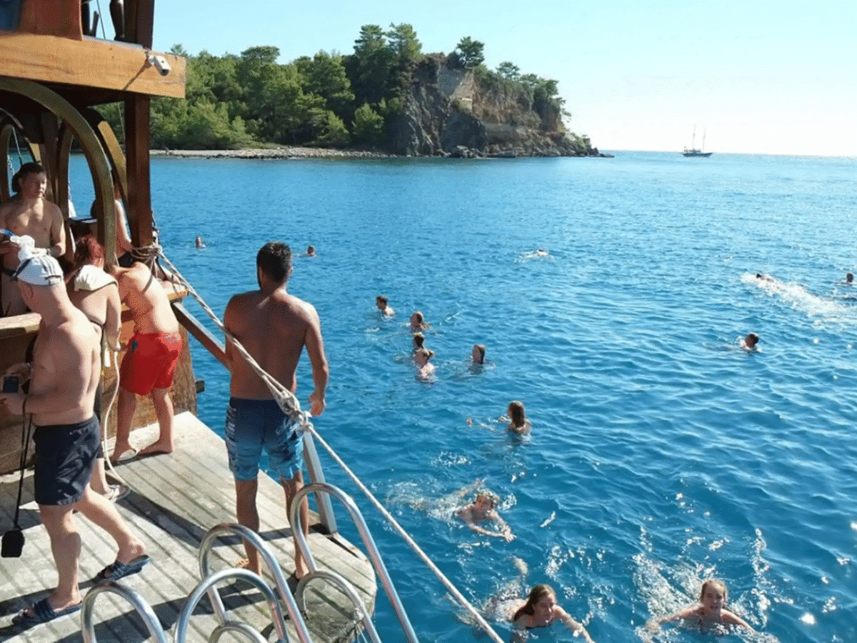 Serenity on the Sea: Waterfall Cruise with Lunch & Swim Breaks