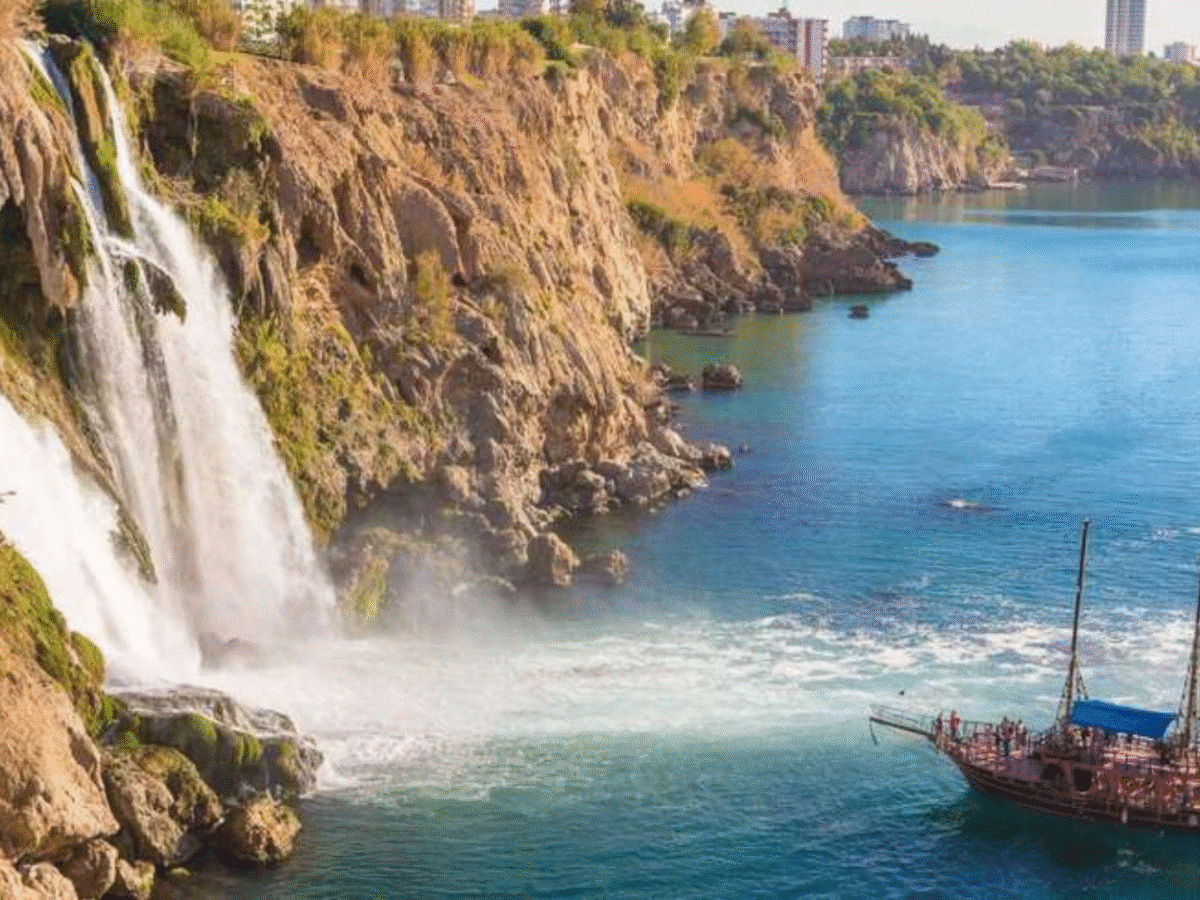 Serenity on the Sea: Waterfall Cruise with Lunch & Swim Breaks